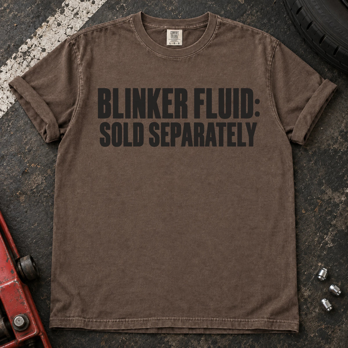 Espresso car enthusiast T-shirt. Blinker fluid sold separately, in dry automotive-humor lettering.
