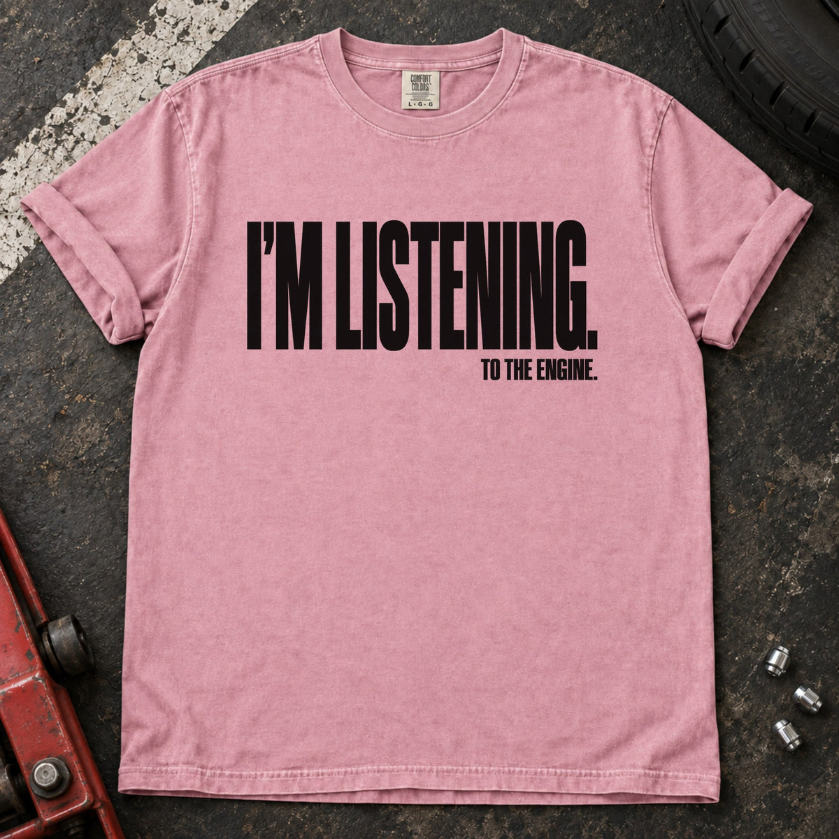 Blossom T-shirt with bold condensed lettering reading 'I'm listening to the engine'.