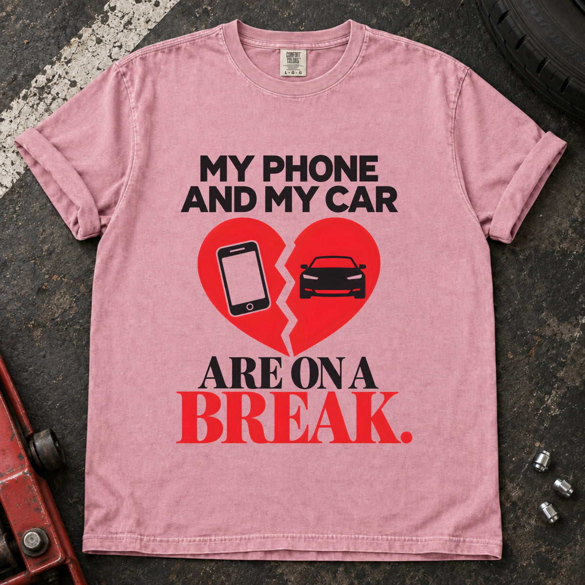 Blossom T-shirt showing a phone and car on a broken heart with 'My phone and my car are on a break'.