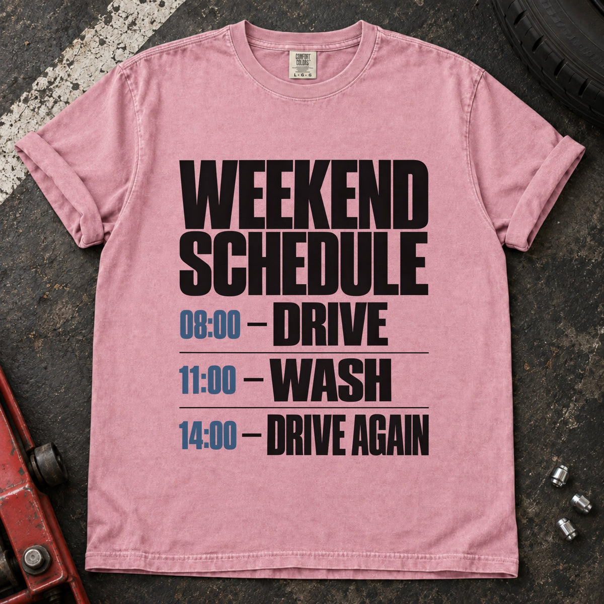 Blossom T-shirt listing a weekend schedule: '08:00 Drive, 11:00 Wash, 14:00 Drive again'.