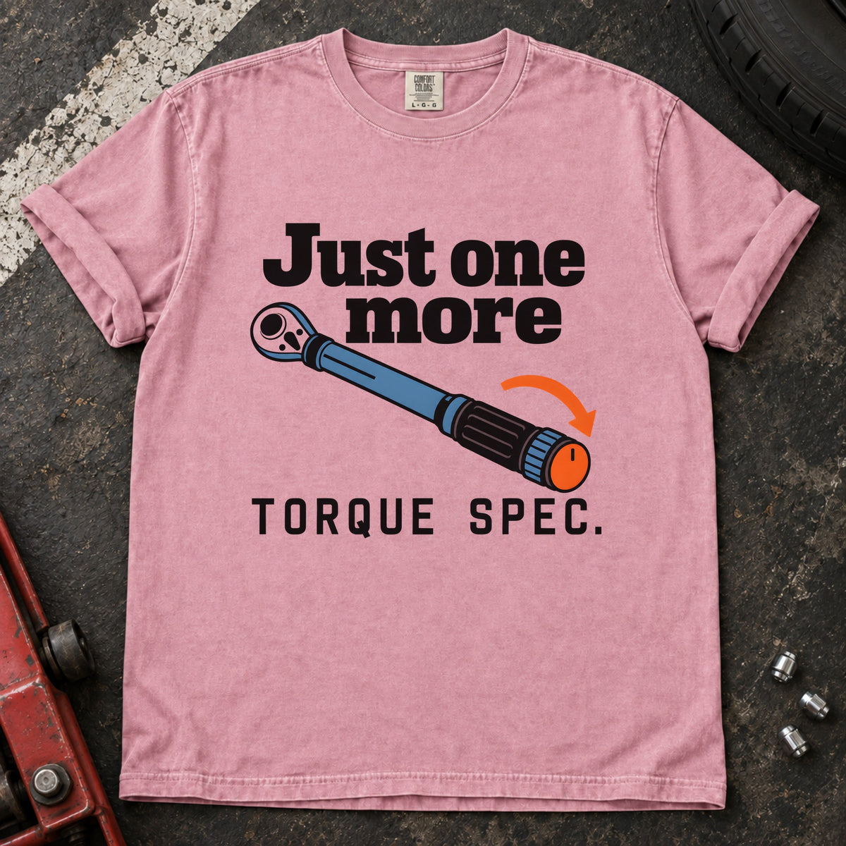 Blossom T-shirt showing a blue torque wrench and orange arrow with 'Just one more torque spec'.
