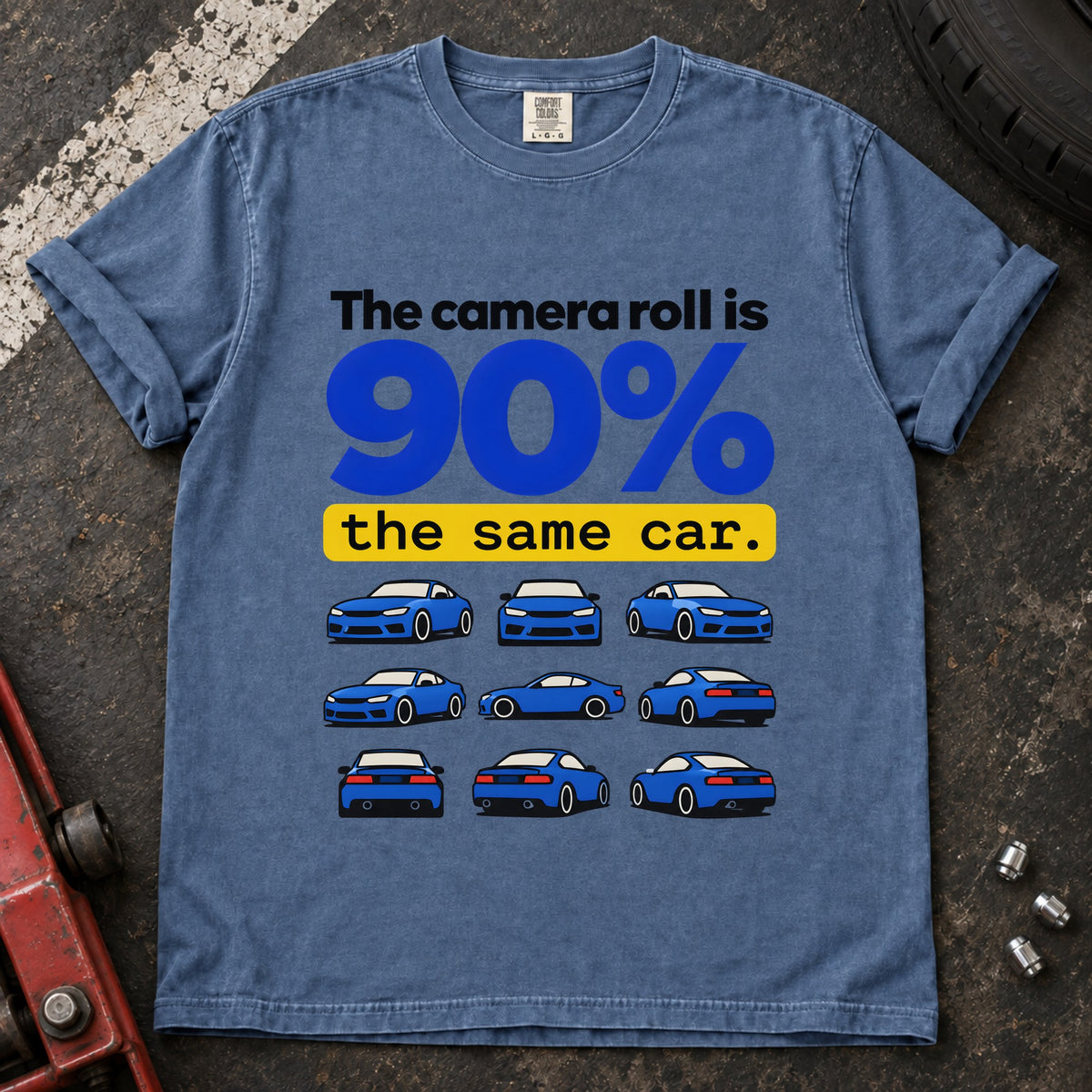 Blue Jean T-shirt showing a grid of small blue cars with 'The camera roll is 90% the same car'.
