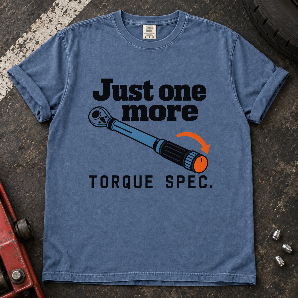 Blue Jean T-shirt showing a blue torque wrench and orange arrow with 'Just one more torque spec'.