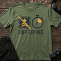 Military Green gaming T-shirt. A crossed-out upgrade and stopwatch show a buff that expired.