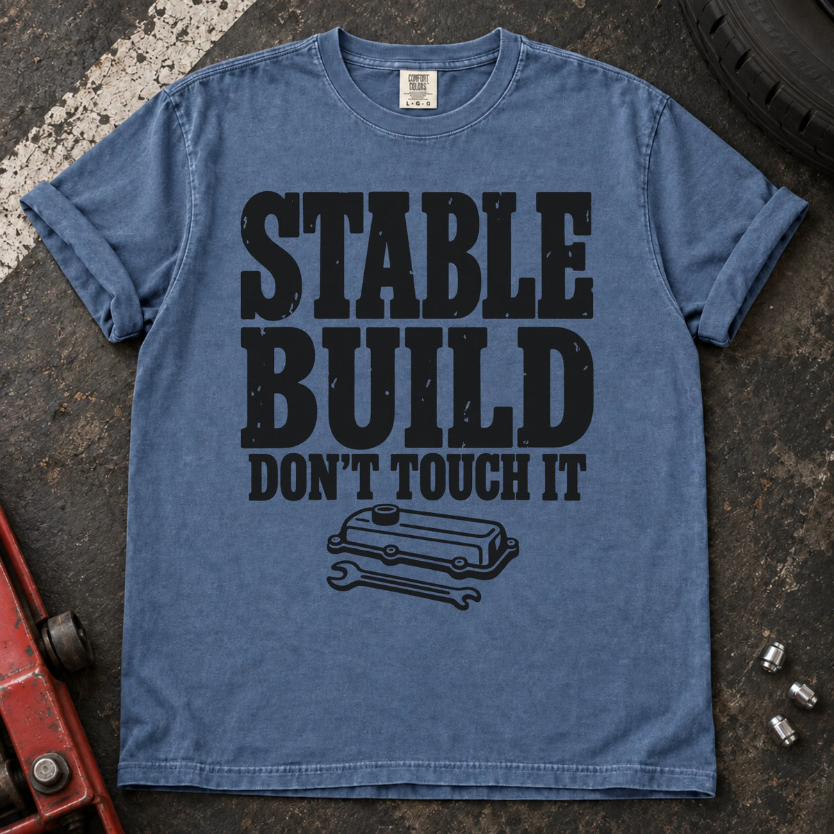 Blue Jean car enthusiast T-shirt. A valve cover and wrench mark a stable build, don't touch it.
