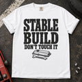 White car enthusiast T-shirt. A valve cover and wrench mark a stable build, don't touch it.