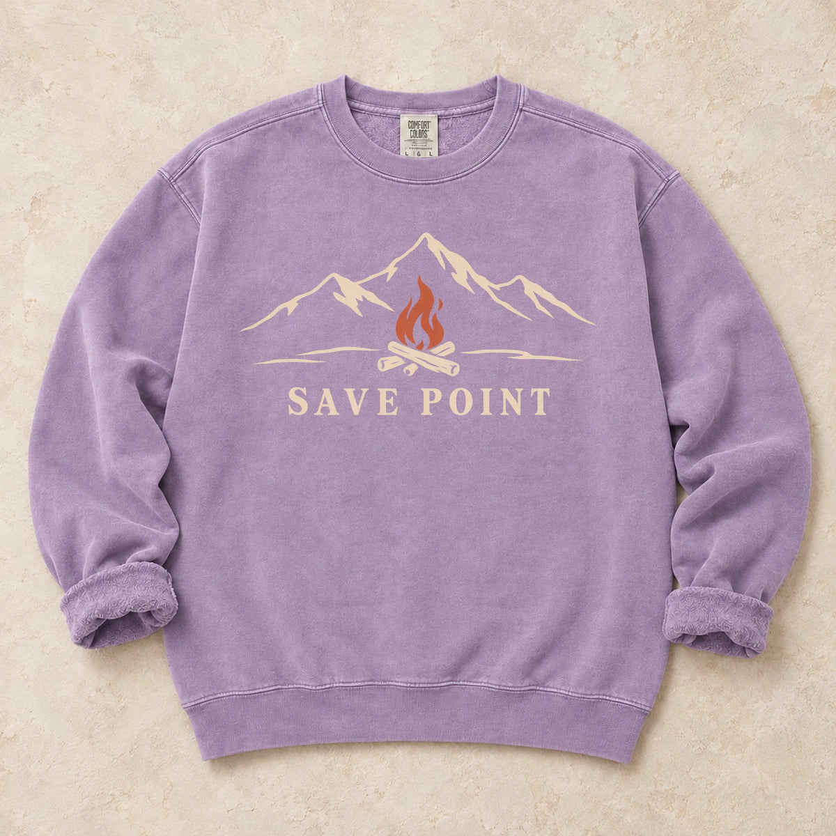 Orchid gaming sweatshirt. A mountain campfire becomes a quiet save point.