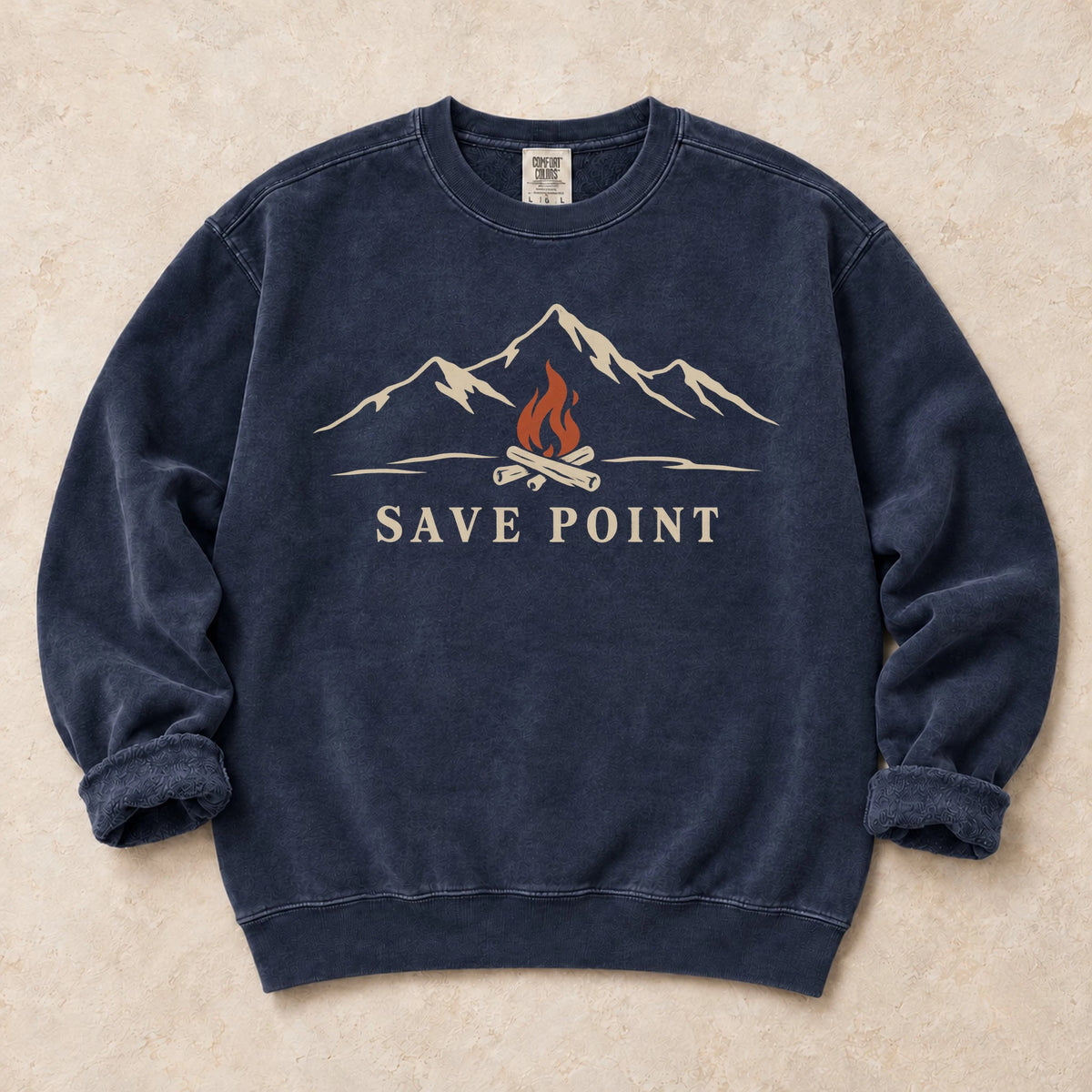 True Navy gaming sweatshirt. A mountain campfire becomes a quiet save point.