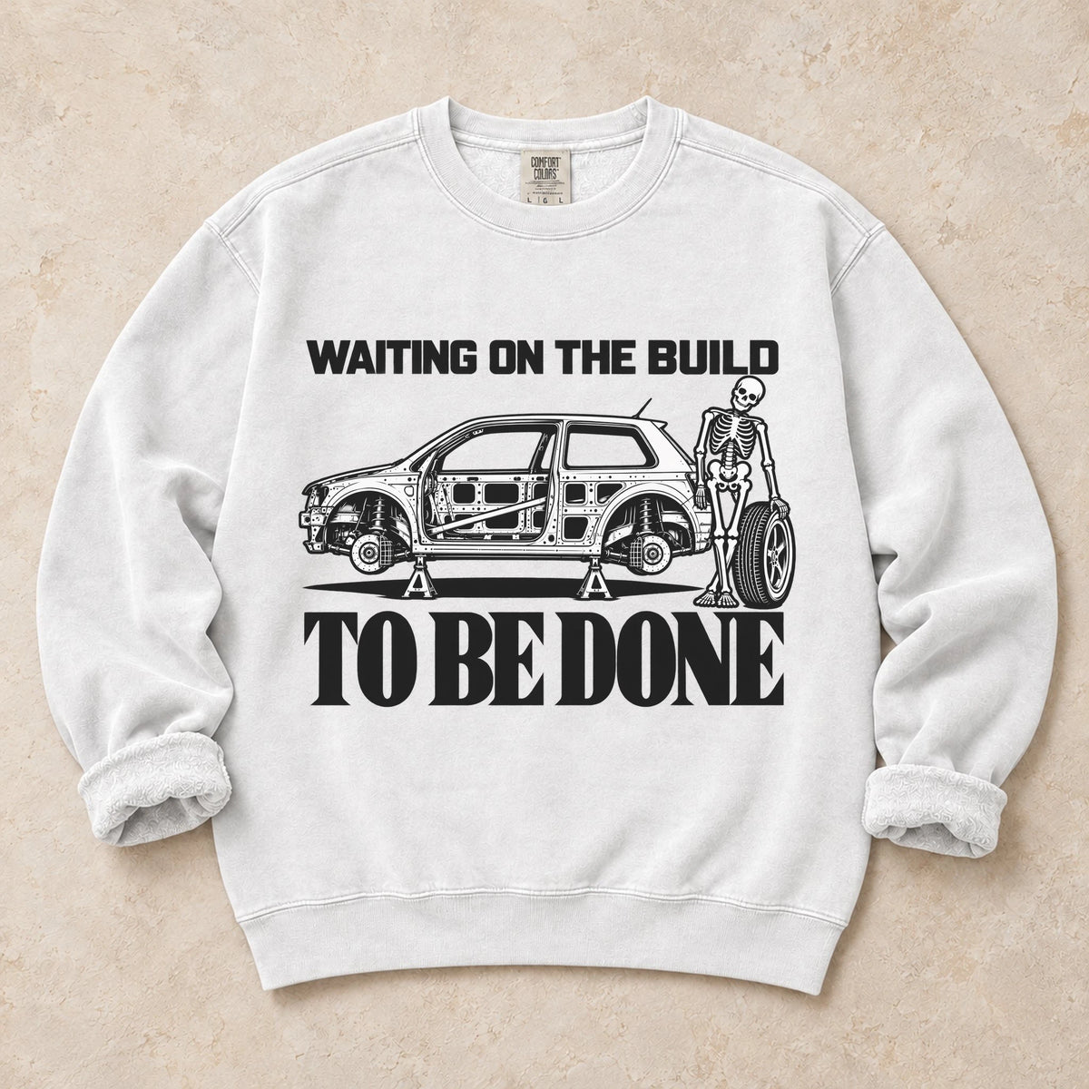White garment-dyed crewneck sweatshirt with Permanent Project project car design