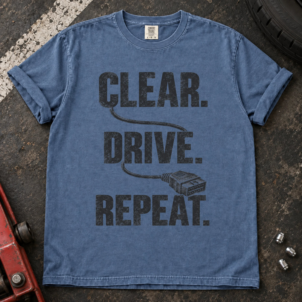 Blue Jean car enthusiast T-shirt. A diagnostic cable connects clear, drive, repeat.