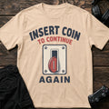 Natural gaming T-shirt. A coin slot asks players to insert coin to continue, again.