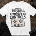 White gaming T-shirt. A retro controller accompanies needing to remember the controls, not a tutorial.