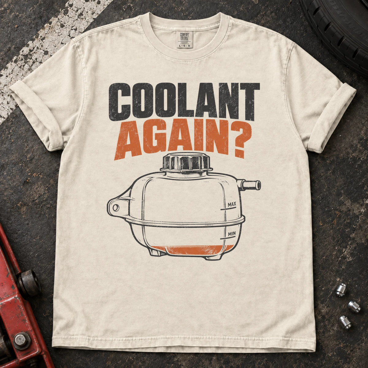 Ivory car enthusiast T-shirt. A low reservoir asks the weary maintenance question, coolant again?
