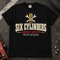 Black car enthusiast T-shirt. A piston and crossed wrenches welcome the Six Cylinders Owners Society.