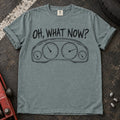 Bay car enthusiast T-shirt. An instrument cluster meets the familiar car-owner question, oh, what now?