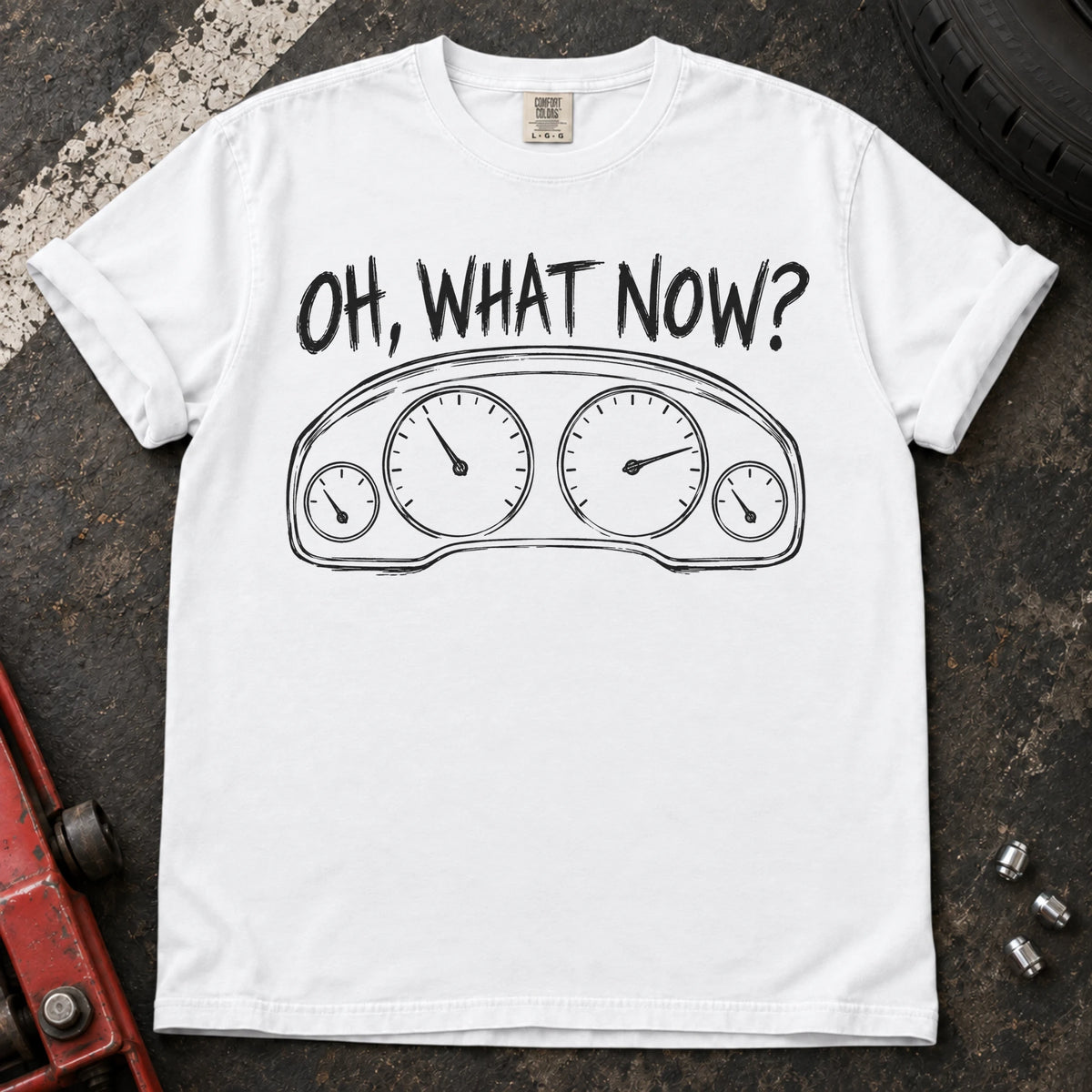 White car enthusiast T-shirt. An instrument cluster meets the familiar car-owner question, oh, what now?