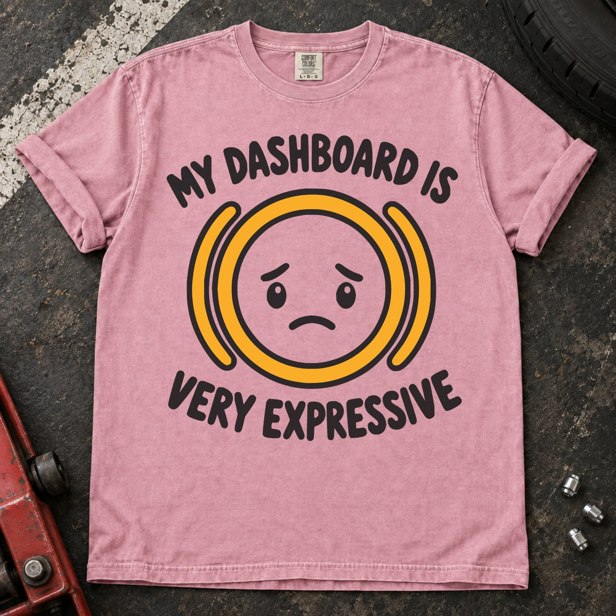 Blossom T-shirt showing a worried face inside an amber warning symbol with 'My dashboard is very expressive'.
