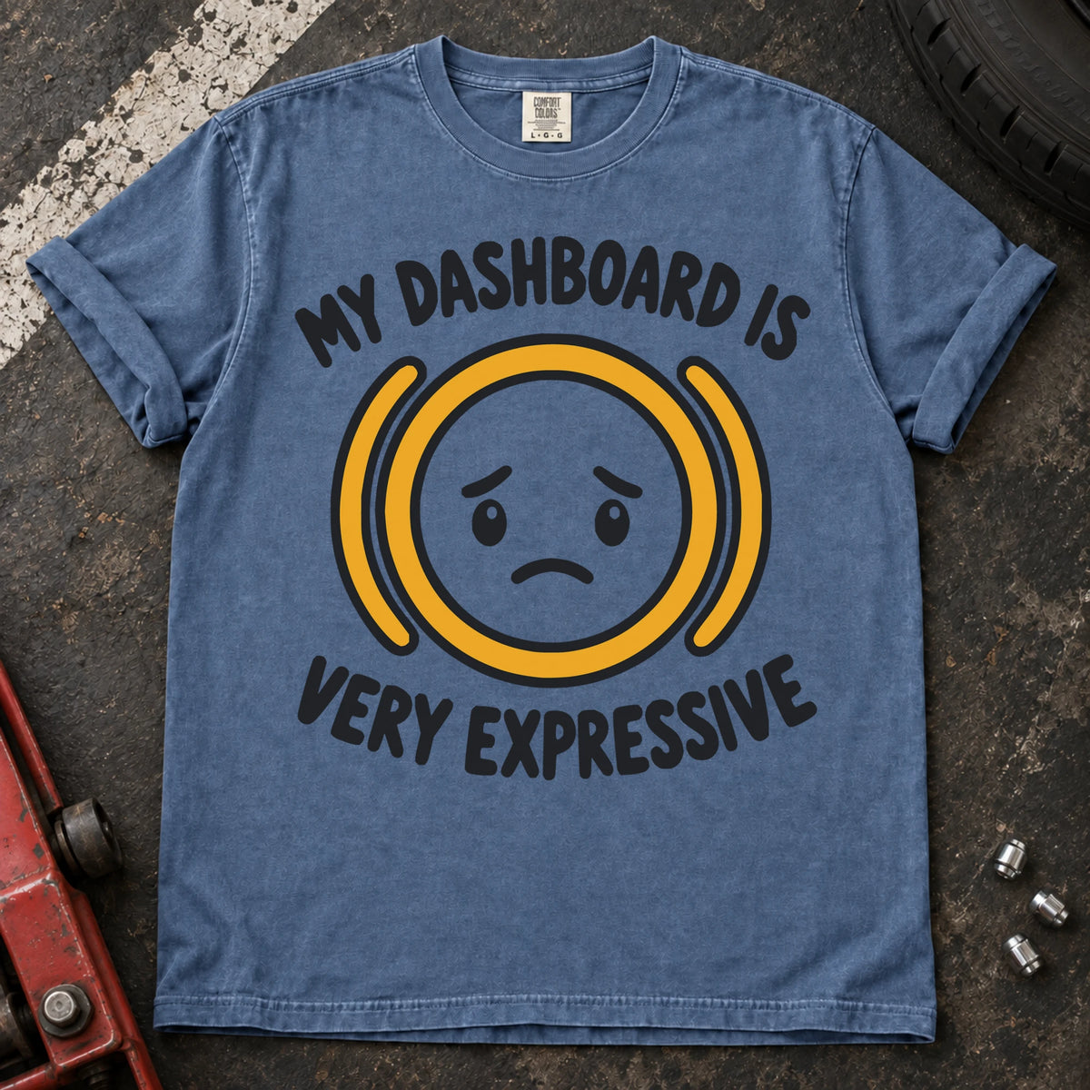 Blue Jean T-shirt showing a worried face inside an amber warning symbol with 'My dashboard is very expressive'.
