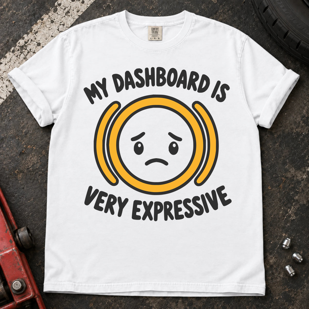 White T-shirt showing a worried face inside an amber warning symbol with 'My dashboard is very expressive'.