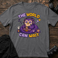 Charcoal gaming T-shirt. A sleepy owl in headphones reminds players the world can wait.