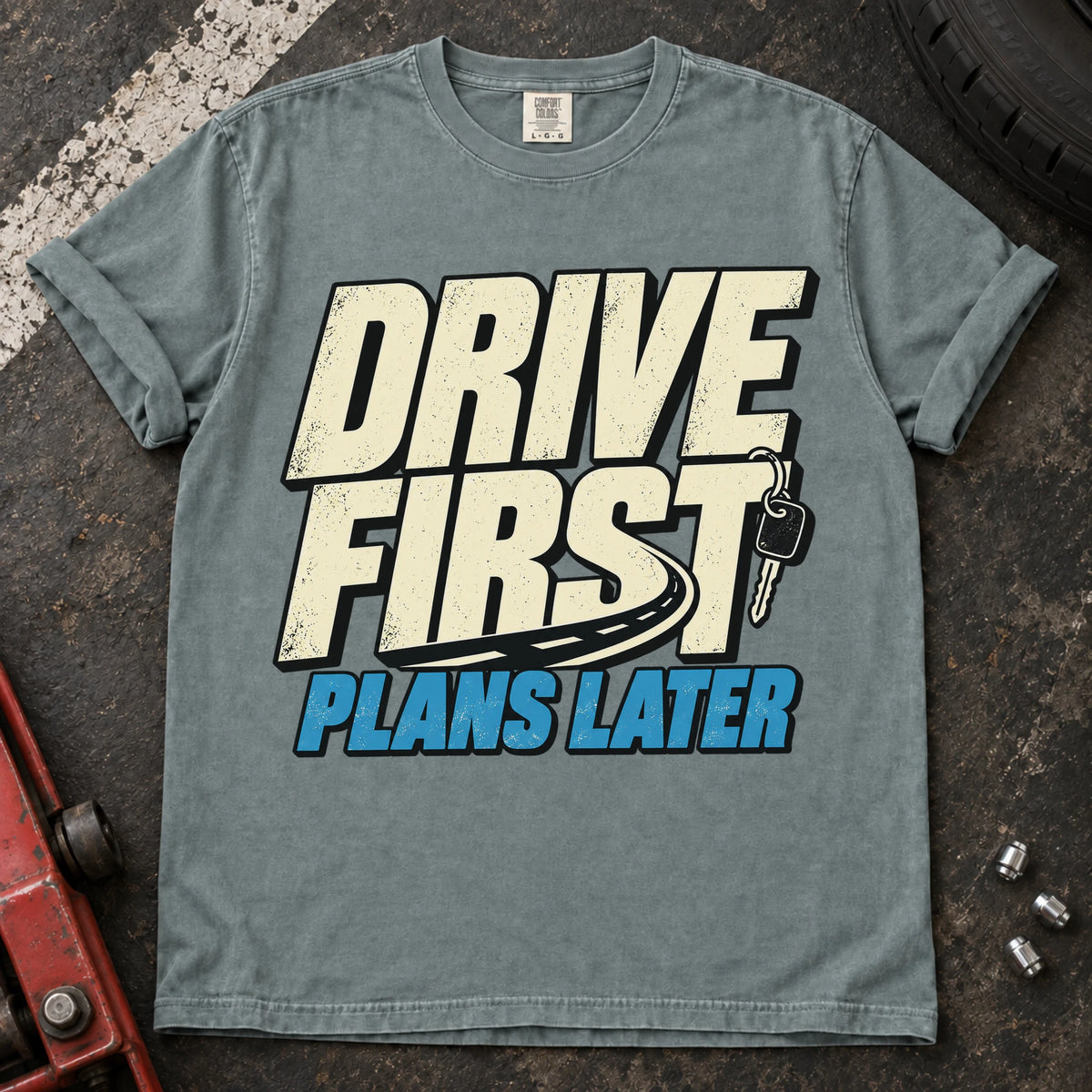 Bay car enthusiast T-shirt. A car key backs drive first, plans later.