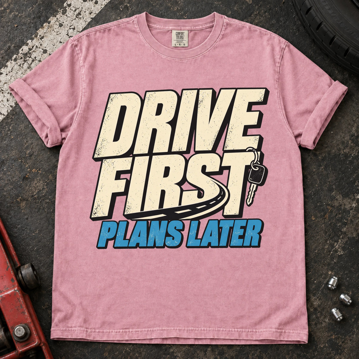 Blossom car enthusiast T-shirt. A car key backs drive first, plans later.