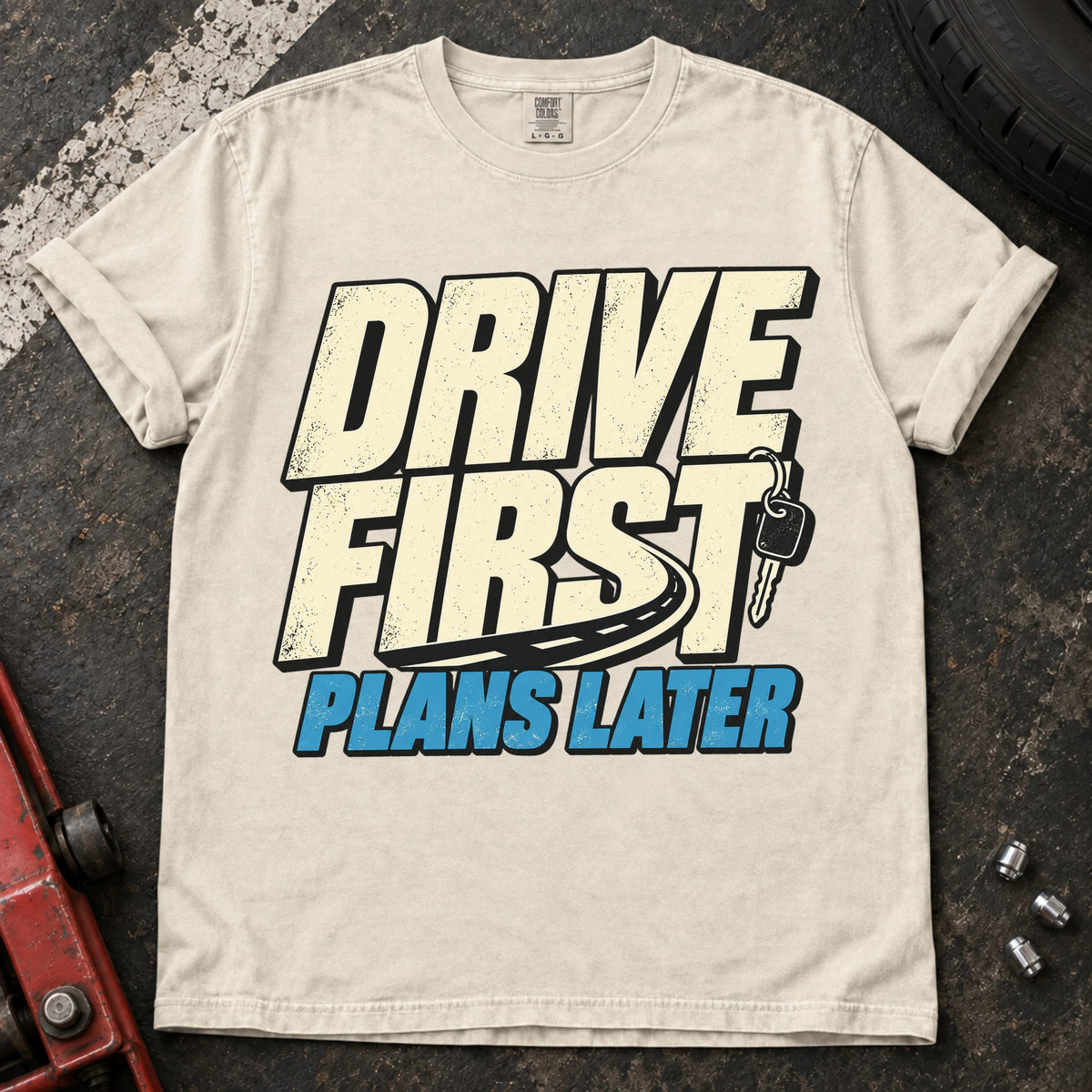 Ivory car enthusiast T-shirt. A car key backs drive first, plans later.
