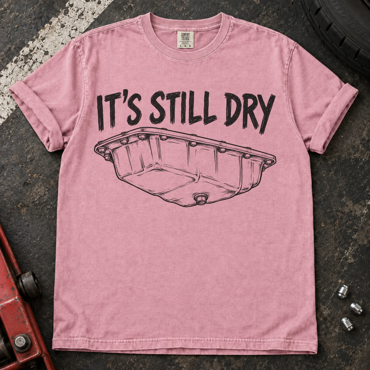 Blossom car enthusiast T-shirt. An oil-pan illustration makes it's still dry a cautious automotive joke.