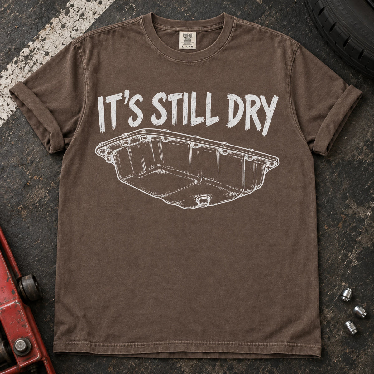 Espresso car enthusiast T-shirt. An oil-pan illustration makes it's still dry a cautious automotive joke.