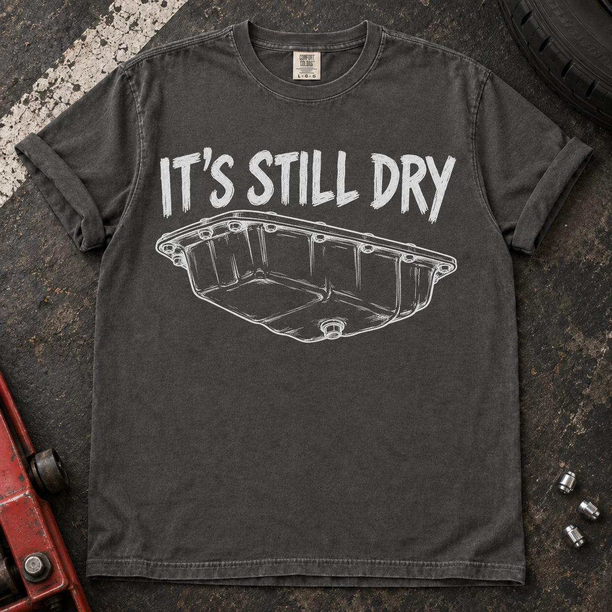 Pepper car enthusiast T-shirt. An oil-pan illustration makes it's still dry a cautious automotive joke.