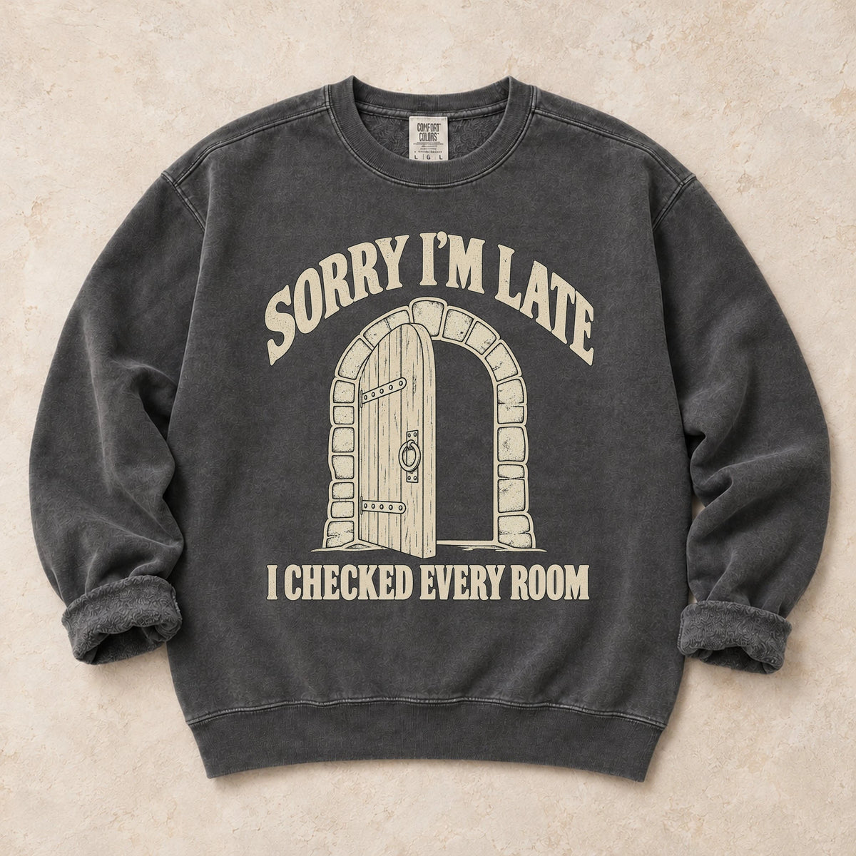 Pepper gaming sweatshirt. A dungeon door explains being late because every room got checked.