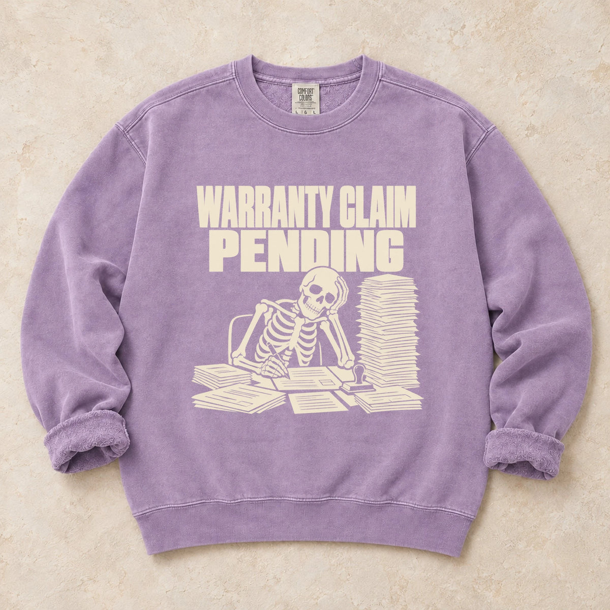 Orchid garment-dyed crewneck sweatshirt with Warranty Queue mechanic humor design