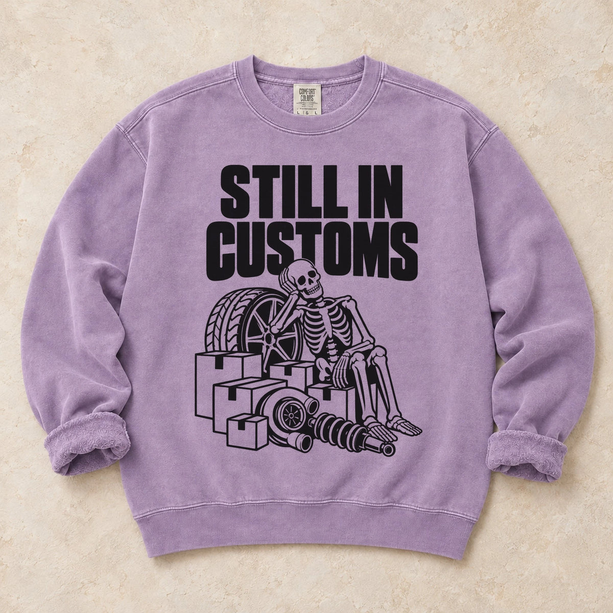 Orchid garment-dyed crewneck sweatshirt with Customs Hold car parts design