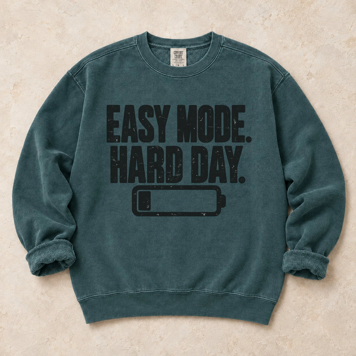 Blue Spruce gaming sweatshirt. Easy mode, hard day, with a low battery for after-work gamers.