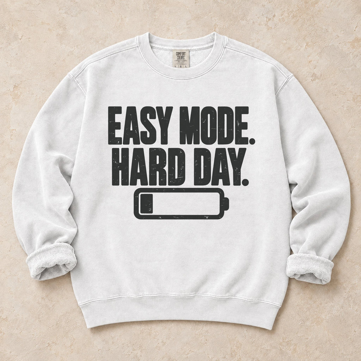 White gaming sweatshirt. Easy mode, hard day, with a low battery for after-work gamers.