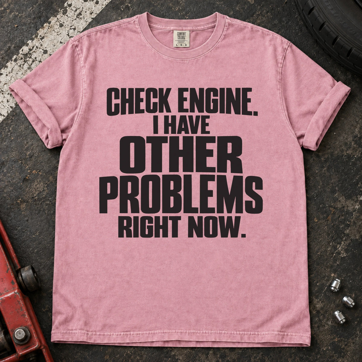 Blossom T-shirt reading 'Check engine. I have other problems right now' in stacked lettering.