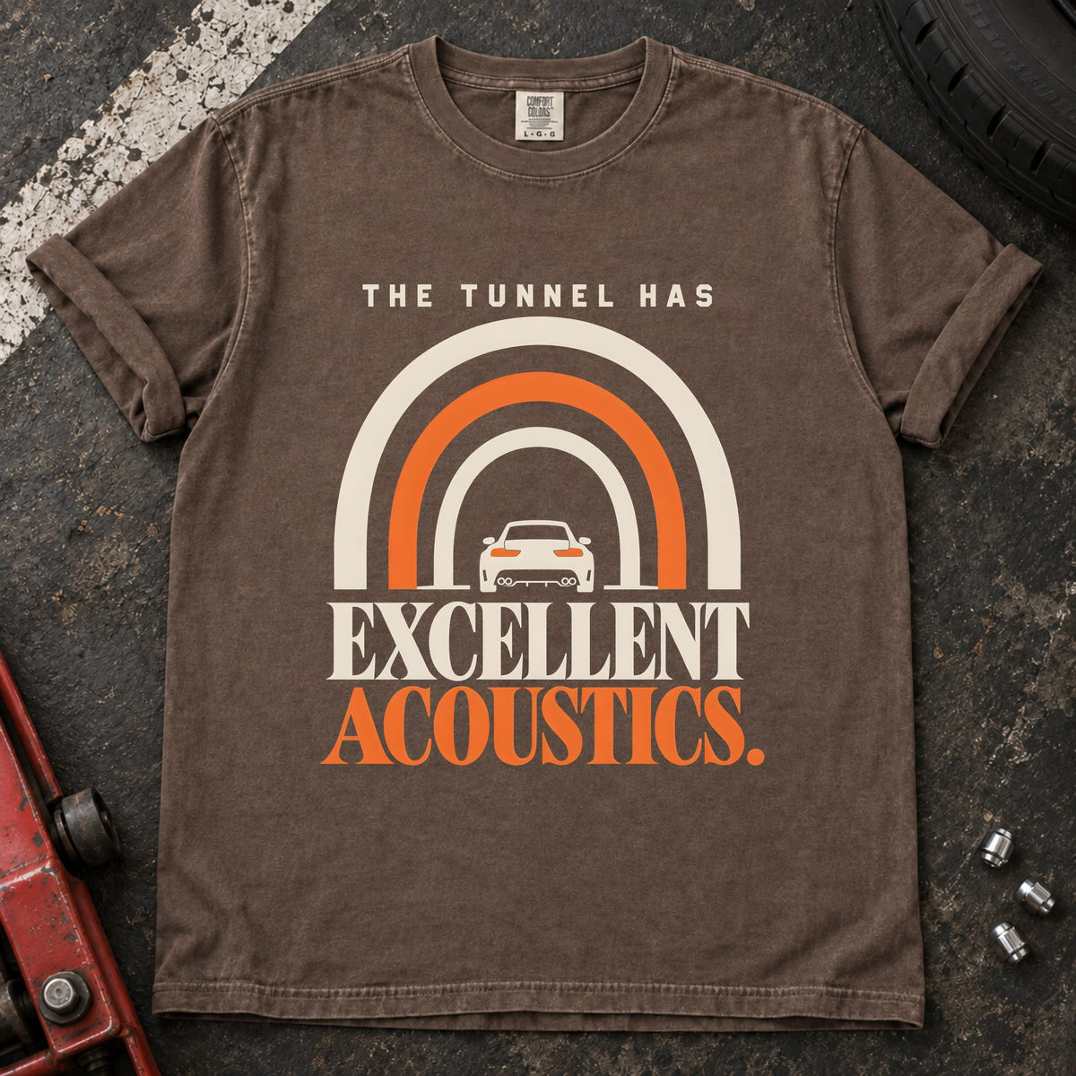 Espresso T-shirt showing a car beneath a tunnel-shaped arch with 'The tunnel has excellent acoustics'.