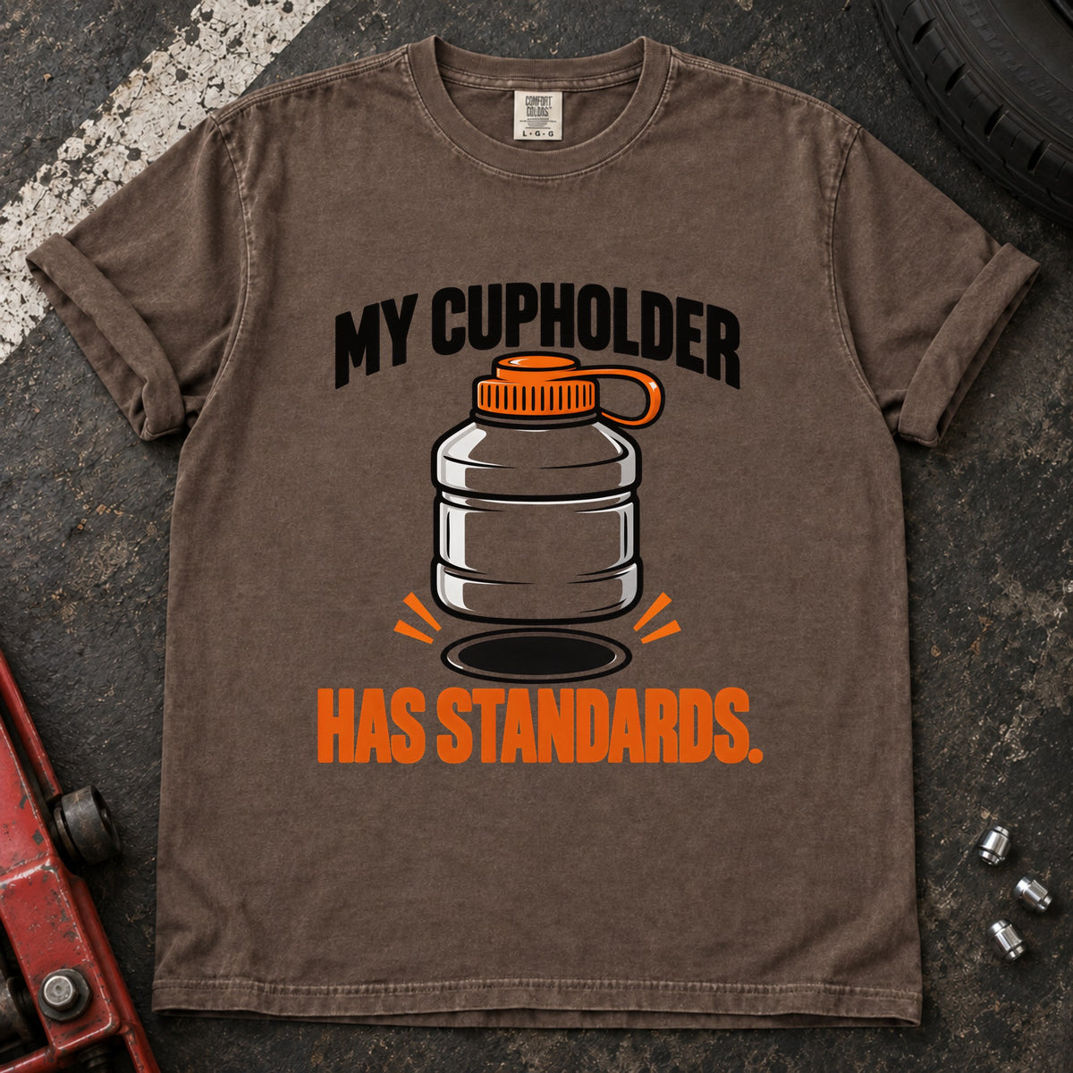 Espresso T-shirt showing an oversized bottle and cupholder with 'My cupholder has standards'.