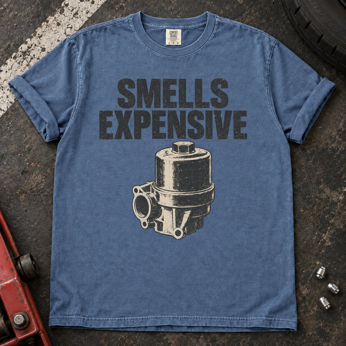 Blue Jean car enthusiast T-shirt. A mechanical pump accompanies the ominous diagnosis, smells expensive.
