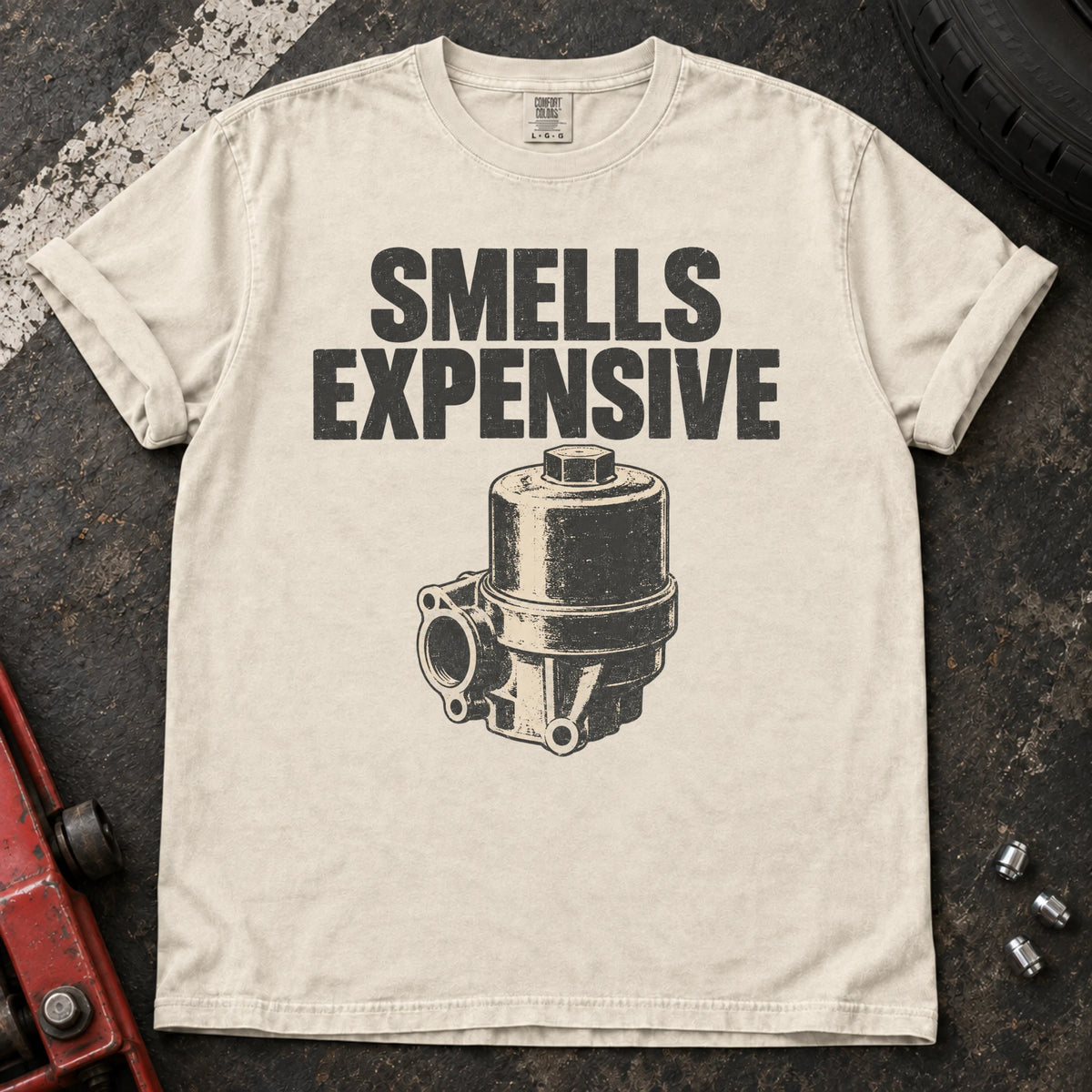 Ivory car enthusiast T-shirt. A mechanical pump accompanies the ominous diagnosis, smells expensive.