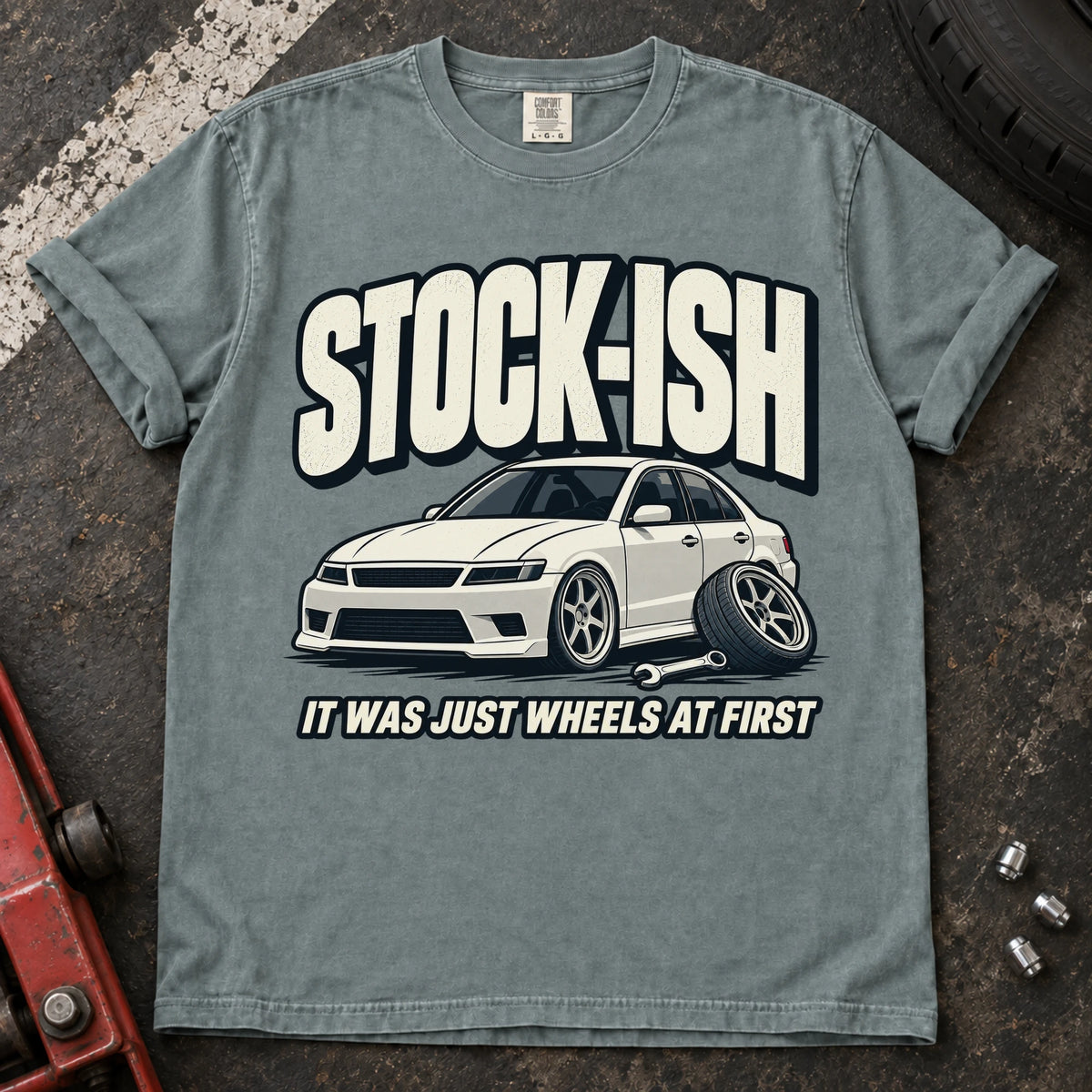 Bay car enthusiast T-shirt. A modified sedan admits stock-ish, it was just wheels at first.
