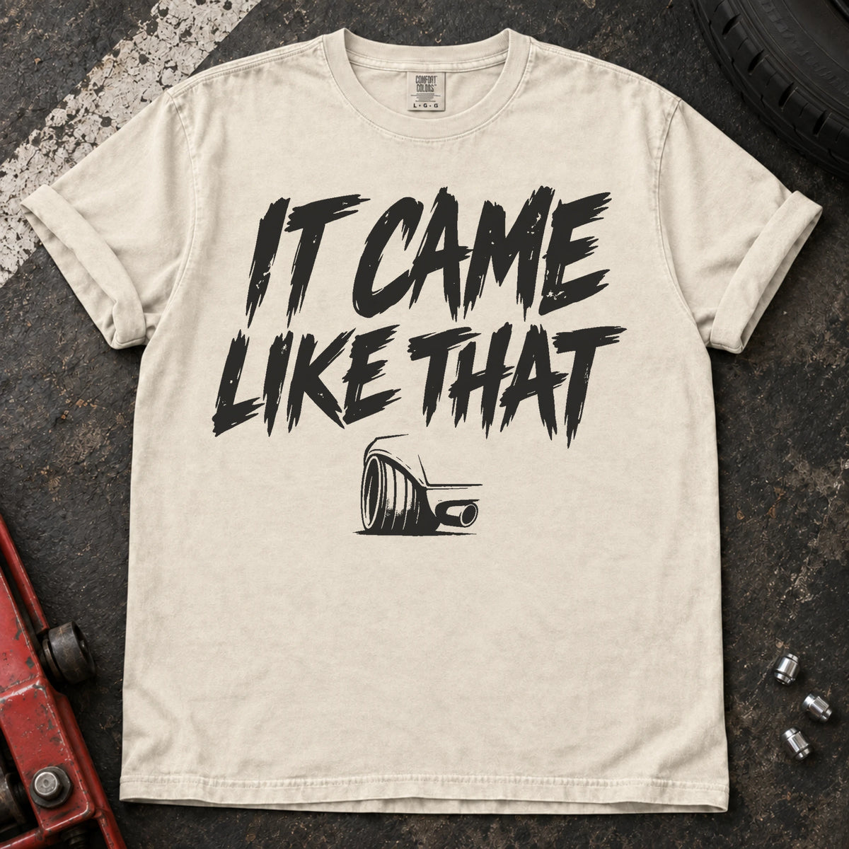 Ivory car enthusiast T-shirt. An exhaust tip backs the excuse, it came like that.