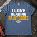 Blue Jean T-shirt reading 'I love reading fault codes' with a small diagnostic connector graphic.