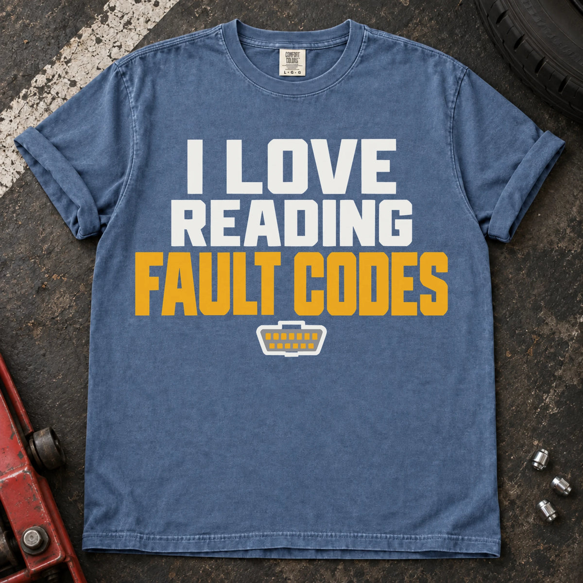 Blue Jean T-shirt reading 'I love reading fault codes' with a small diagnostic connector graphic.