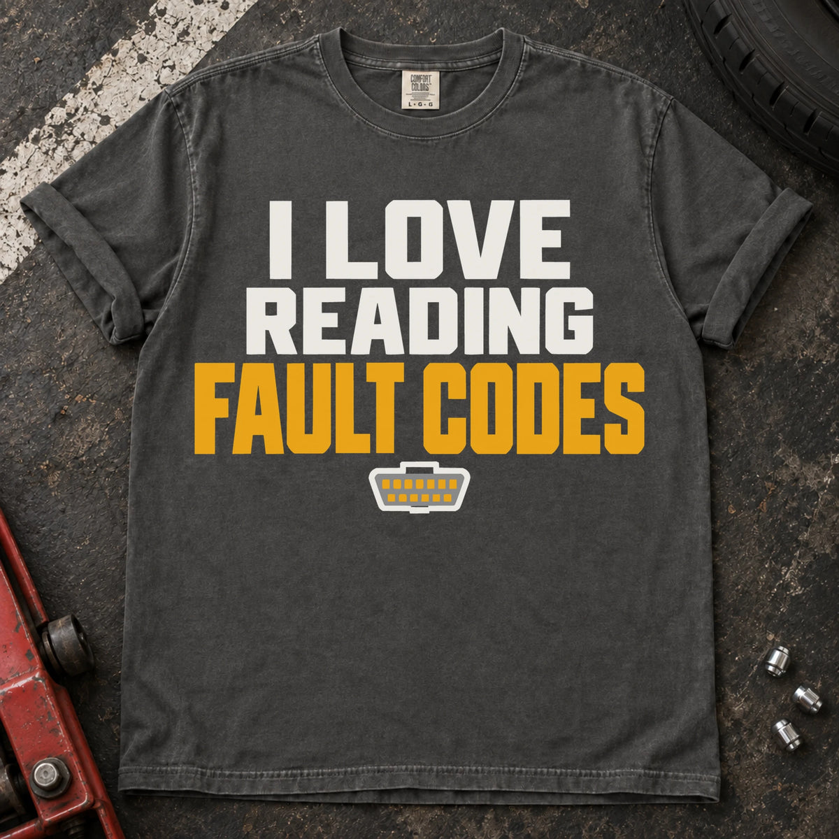 Pepper T-shirt reading 'I love reading fault codes' with a small diagnostic connector graphic.