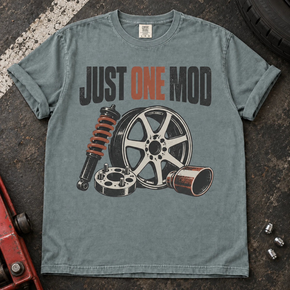 Bay car enthusiast T-shirt. A wheel, suspension and intake parts tempt the owner into just one mod.