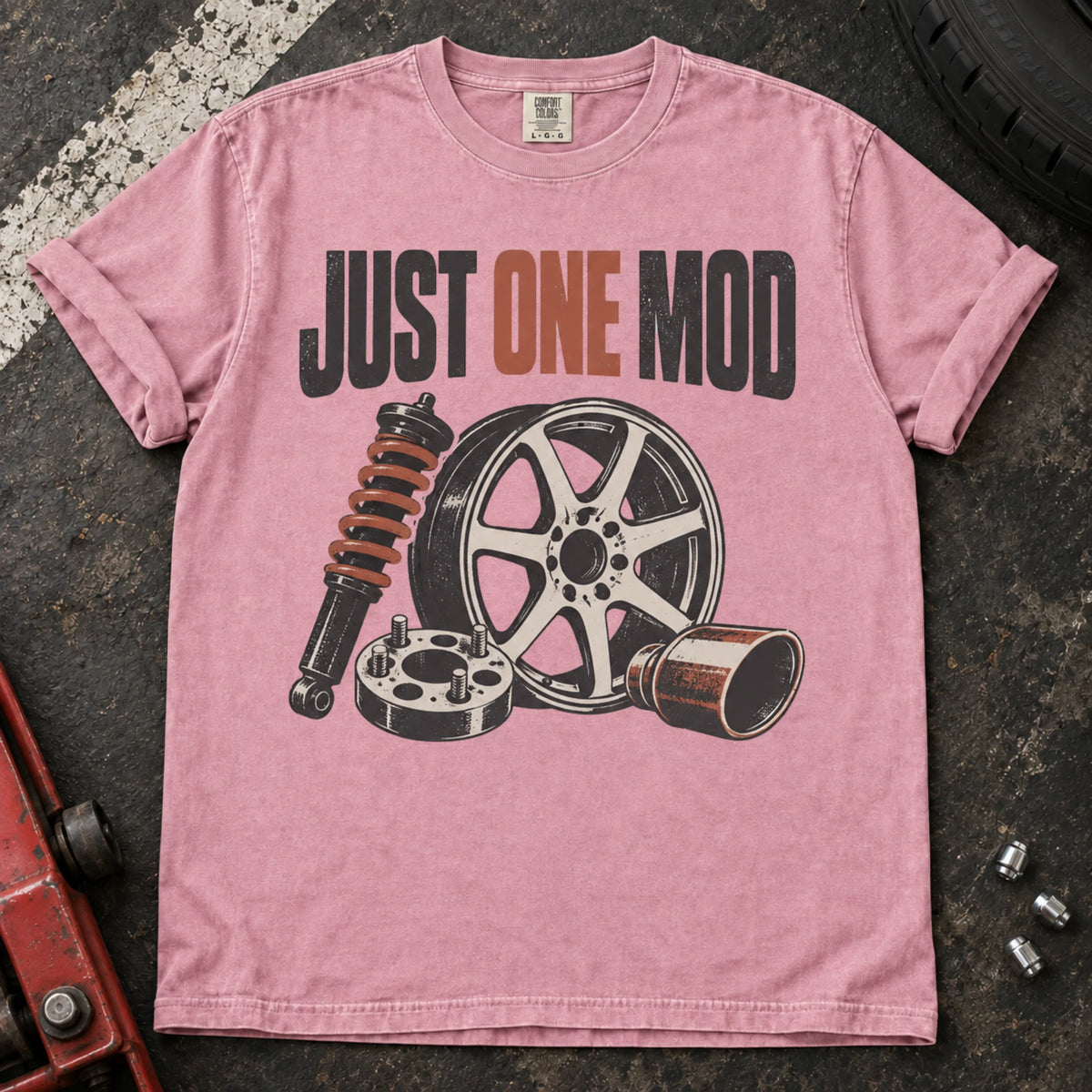 Blossom car enthusiast T-shirt. A wheel, suspension and intake parts tempt the owner into just one mod.