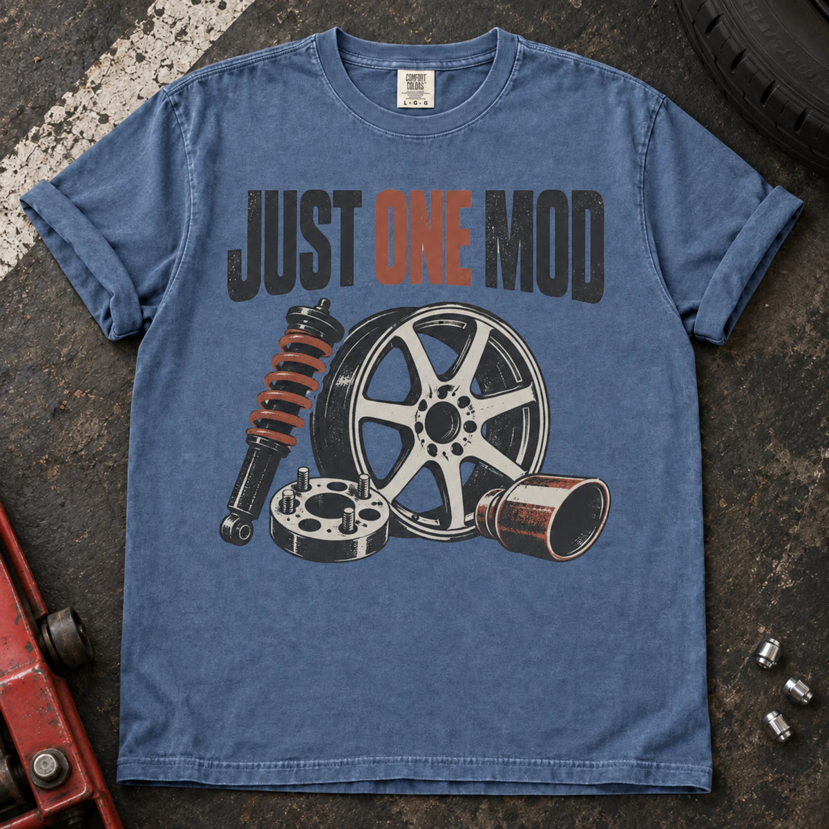 Blue Jean car enthusiast T-shirt. A wheel, suspension and intake parts tempt the owner into just one mod.