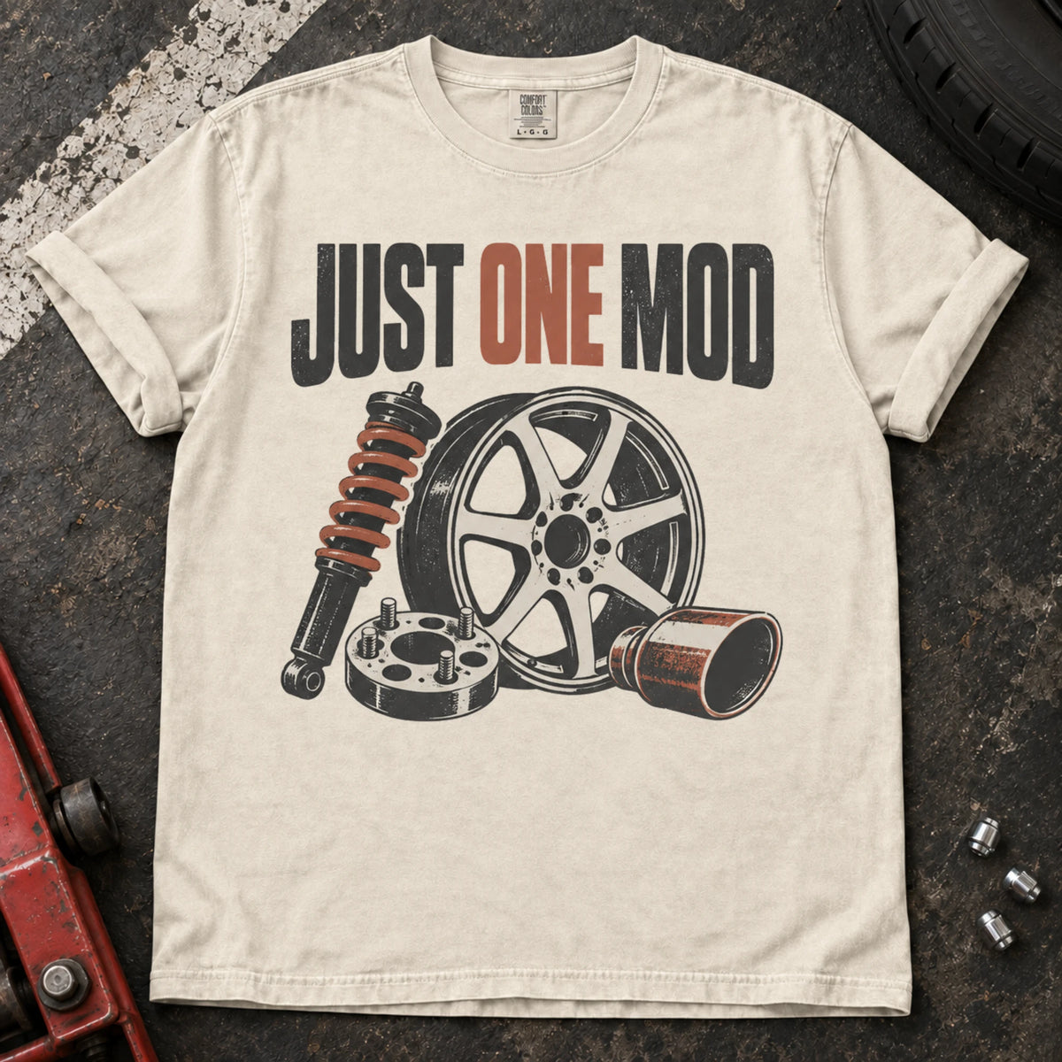 Ivory car enthusiast T-shirt. A wheel, suspension and intake parts tempt the owner into just one mod.