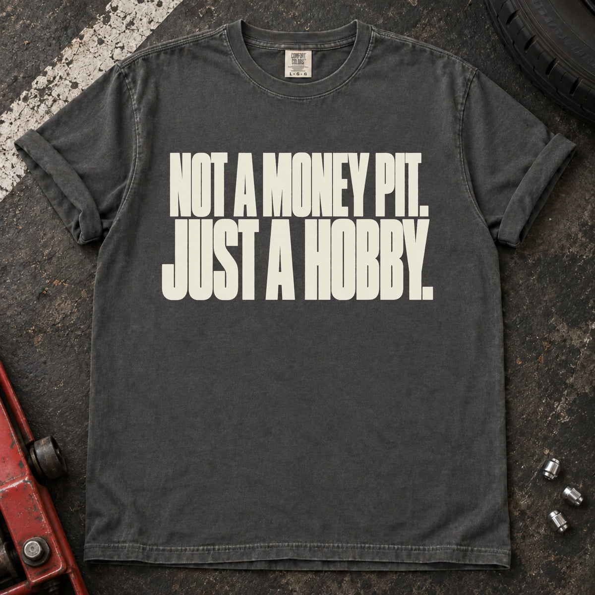 Pepper car enthusiast T-shirt. Not a money pit, just a hobby: clean typography for the car-owner budget.